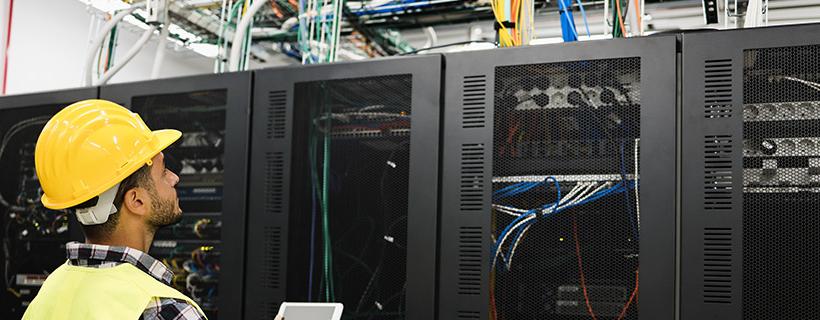 technician solving common data center challenges